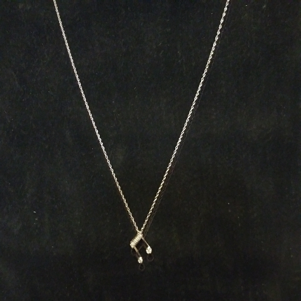 10k white gold music note diamond pendant